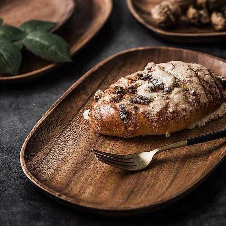 Elegant wooden dining plates with a minimalist, laconic design and natural wood grain