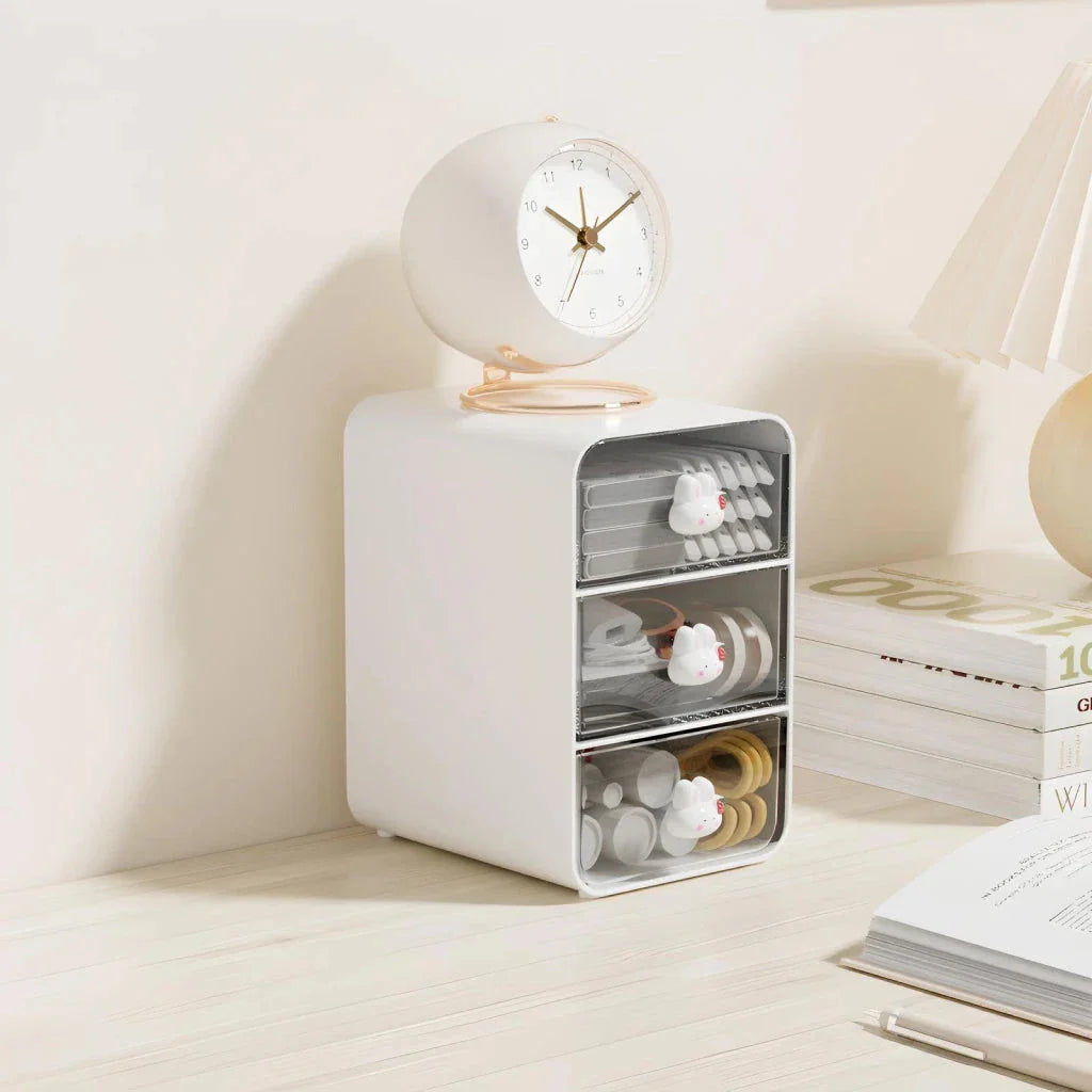Clear acrylic desk organiser with three pull-out drawers, designed to declutter and organise your workspace