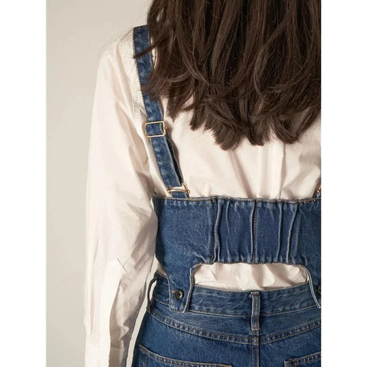 Chic denim two-piece set with sleeveless top and relaxed fit trousers in a stylish and comfortable design