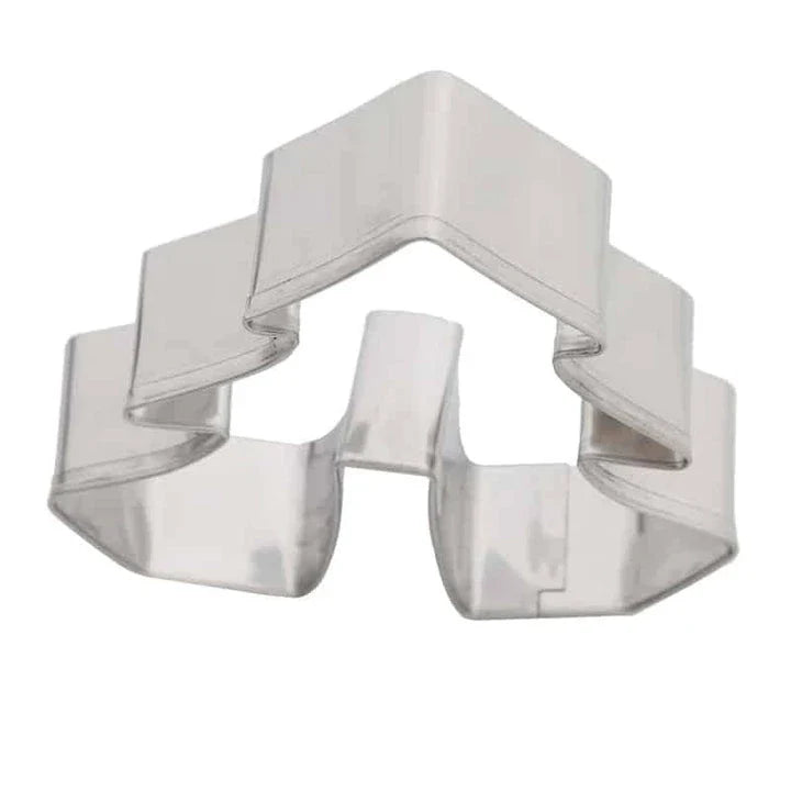 A set of festive, Christmas-themed stainless steel cookie cutters in various shapes including trees, snowflakes, and candy canes