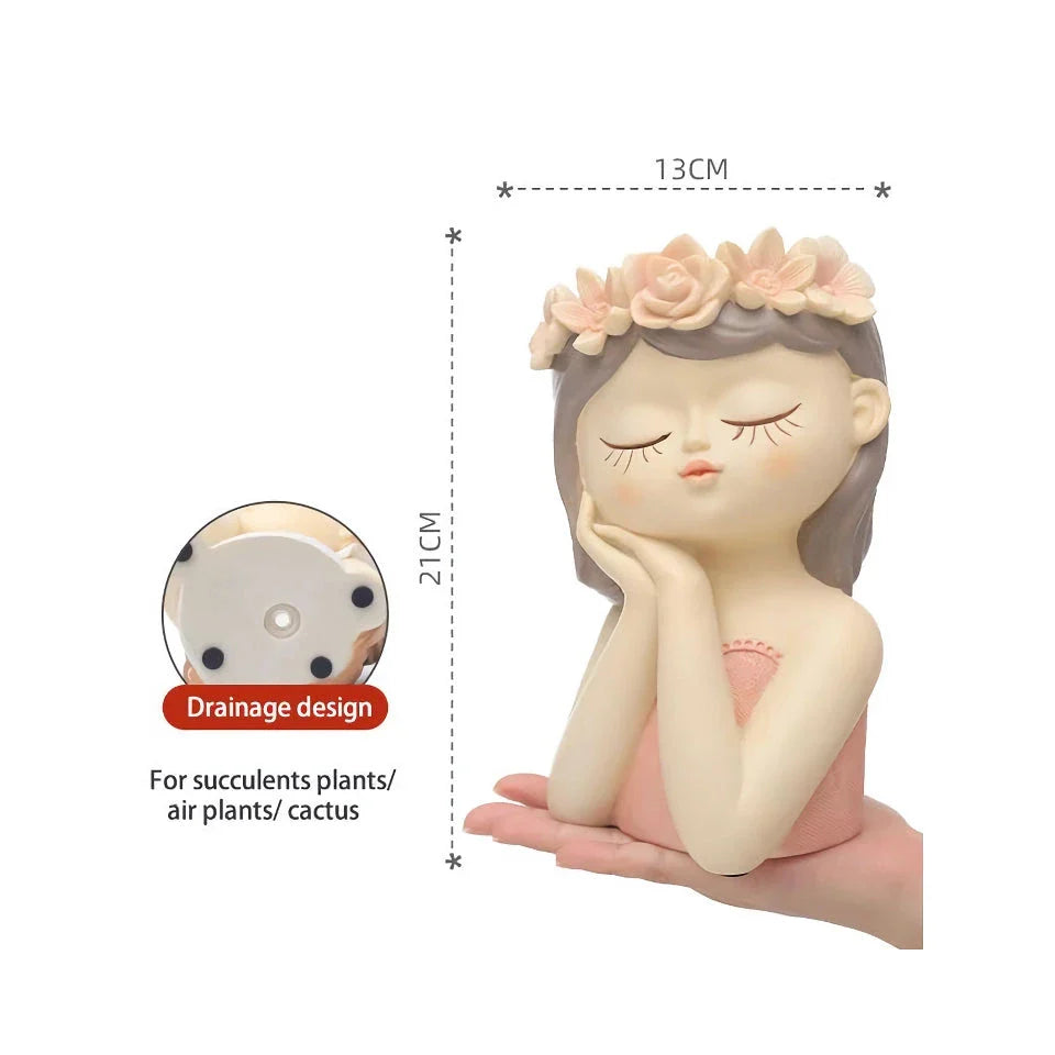 A charming 7.8-inch resin planter in the shape of a fairy girl, perfect for displaying succulents and adding whimsical decor to your home or office.