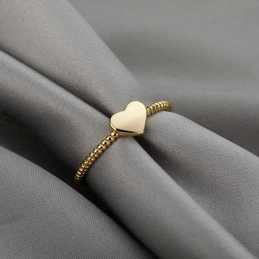 Elegant heart-shaped love ring in stainless steel and copper, a timeless and versatile piece of bridal jewellery
