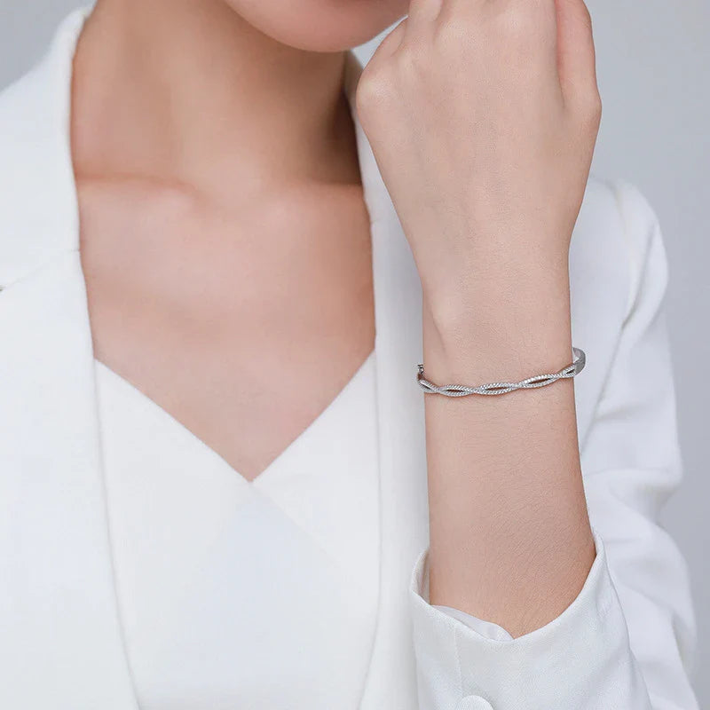 Silver bracelet with wave pattern, ideal for fashion-conscious women in the UK