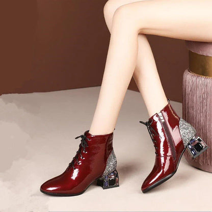 Elegant rhinestone embellished patent leather high heels in a wine red colour