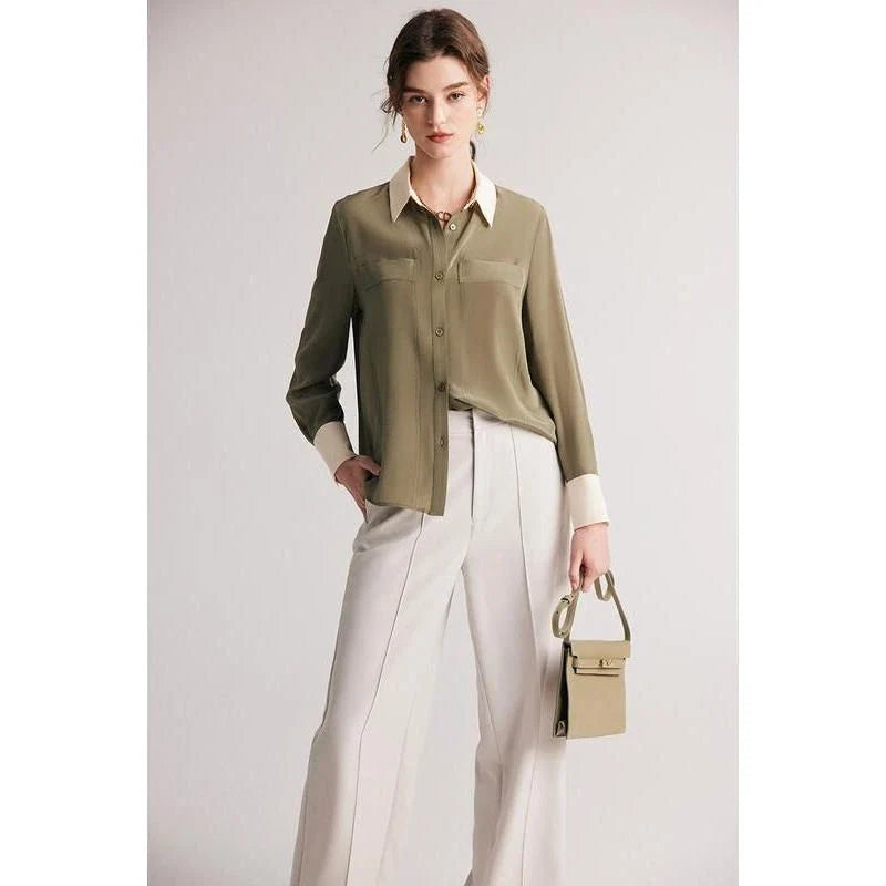 A chic and elegant silk crepe de chine blouse in a timeless solid pattern, perfect for professional and casual wear.