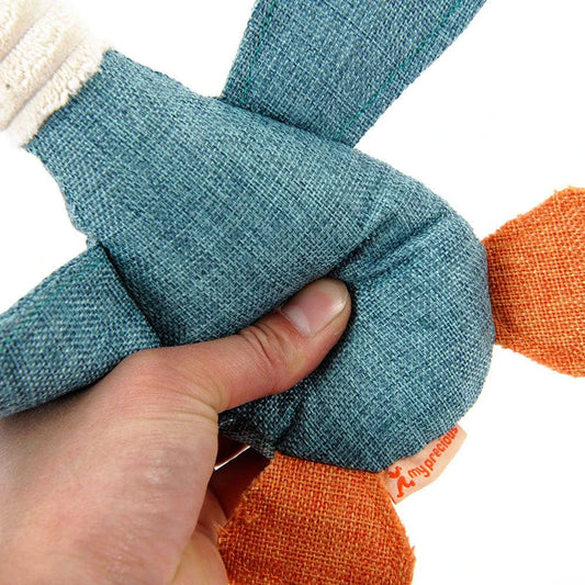 A soft, plush duck toy designed for dogs, featuring a squeaky component to encourage playful interaction.