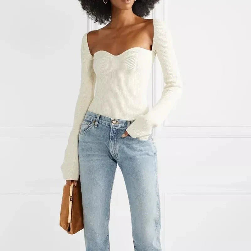 Elegant white knit jumper with side split and square neckline, perfect for casual and formal wear