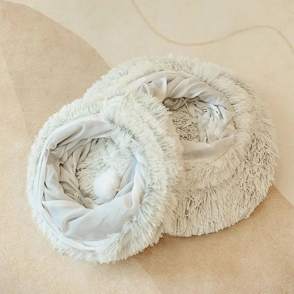 Cosy grey cat tunnel bed with plush cushion, providing a multifunctional and foldable retreat for indoor cats