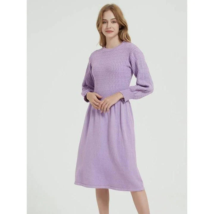 Elegant long sleeve knitted sweater dress in red with a classic A-line silhouette and mid-calf length