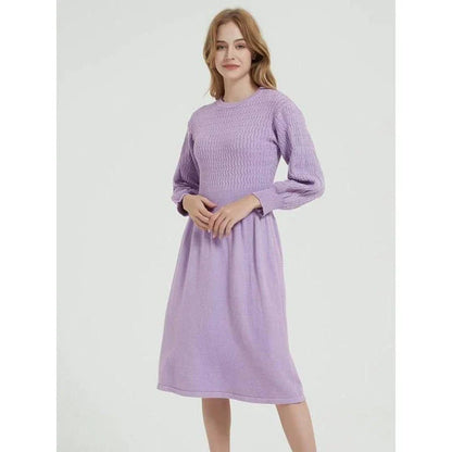 Elegant long sleeve knitted sweater dress in red with a classic A-line silhouette and mid-calf length