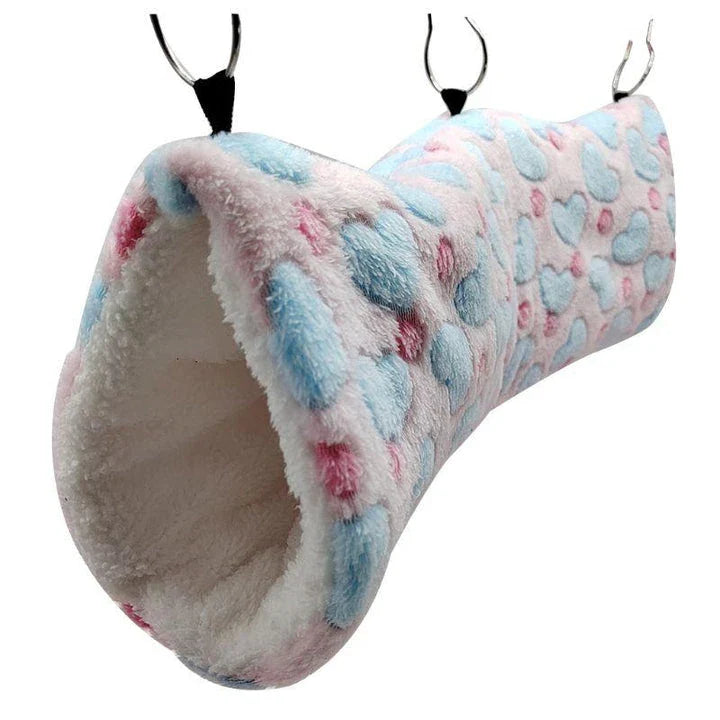 Cosy plush tunnel in grey for small pets like hamsters and guinea pigs, providing a comfortable and secure hideaway