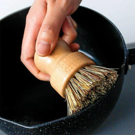 A set of eco-friendly kitchen cleaning brushes with wooden handles and sisal bristles, designed for effective and sustainable cleaning.