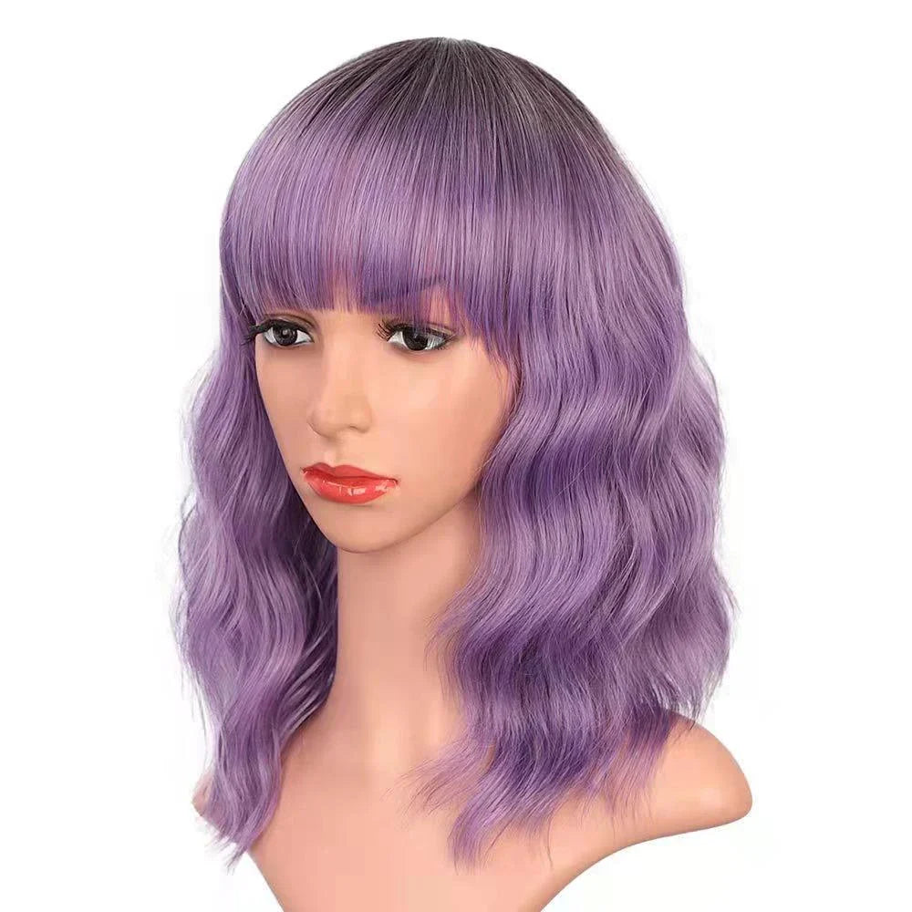Elegant curly wig with soft bangs, crafted with high-quality fibres for a natural, long-lasting look in a variety of stunning colours.