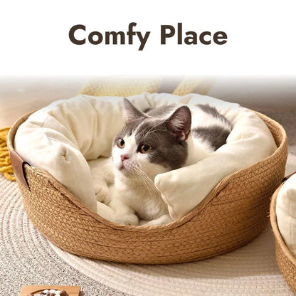 Handmade bamboo pet bed with removable cushion, designed for cosy relaxation of cats and small dogs