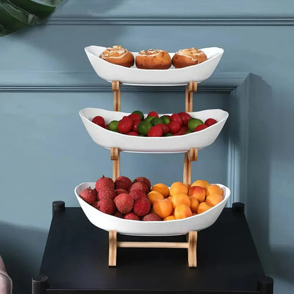 Elegant partitioned oval table plates and tiered fruit bowl with candy and cake trays, perfect for hosting and dining in the UK