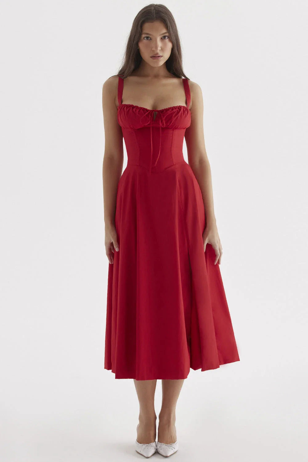 A stylish suspender dress made of premium polyester with a French high-split design, available in a range of vibrant solid colours for versatile summer wear.
