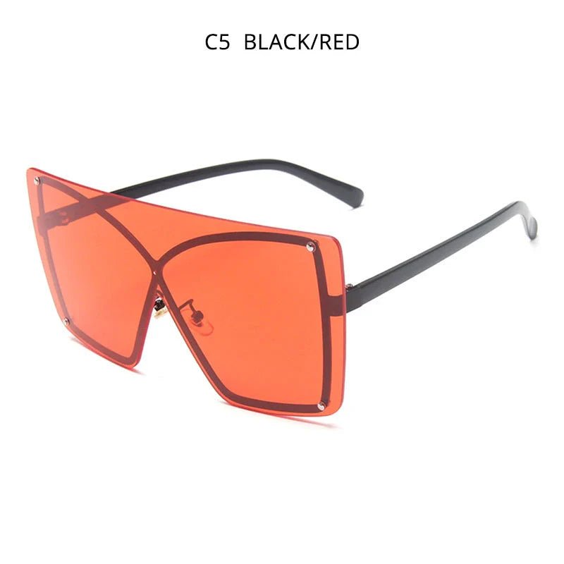 Stylish oversized flat top sunglasses with a rimless design, providing UV protection and a comfortable fit for the modern British woman