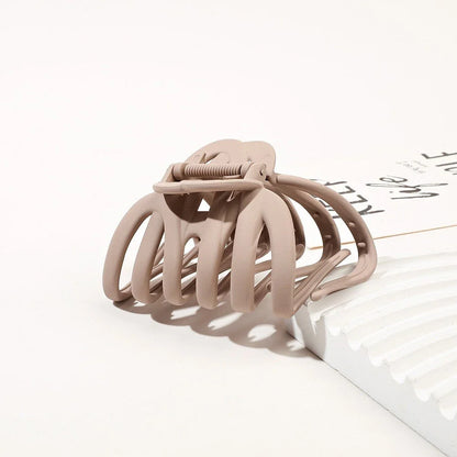 Elegant wave-patterned hair clip barrette for women and girls made of durable rubber and plastic materials