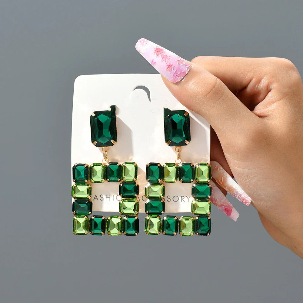 Pair of enchanting crystal earrings made with premium artificial crystals in various colours including rose red, green, pink, champagne, and black