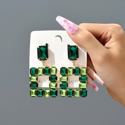Pair of enchanting crystal earrings made with premium artificial crystals in various colours including rose red, green, pink, champagne, and black