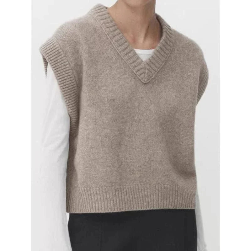 Chic Autumn/Winter Women's Soft Knitted V-Neck Vest in a classic solid colour, featuring a cosy turtleneck collar and sleeveless design for easy layering.