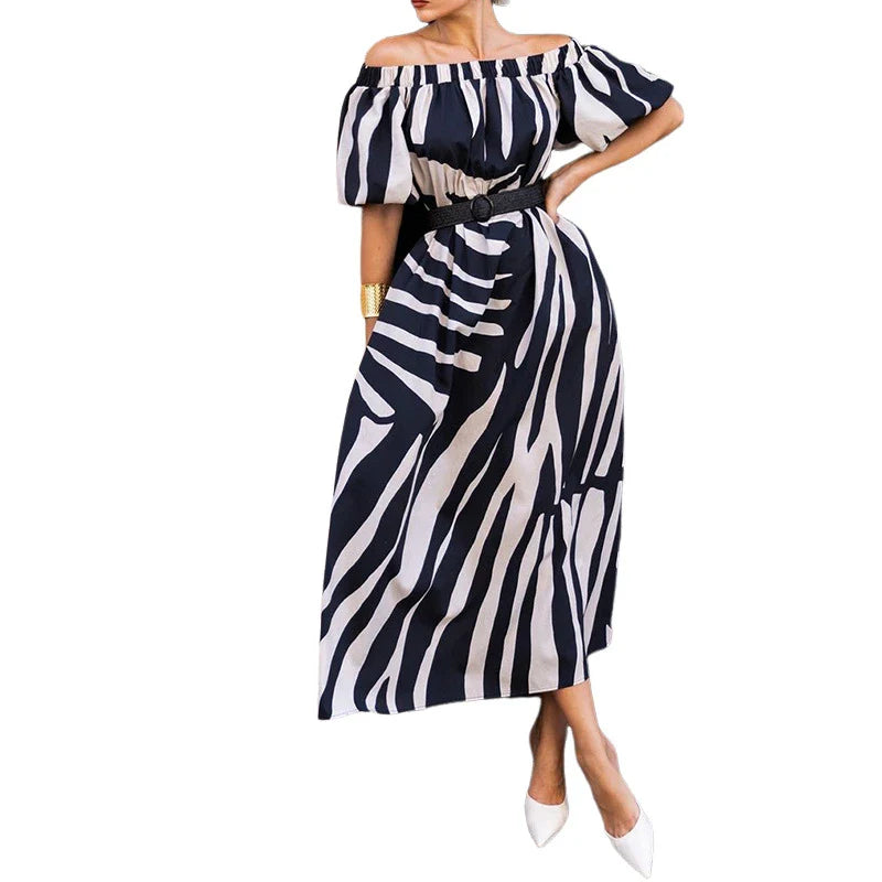 Elegant floral-print off-shoulder midi dress in black, showcasing a feminine A-line silhouette and premium polyester construction