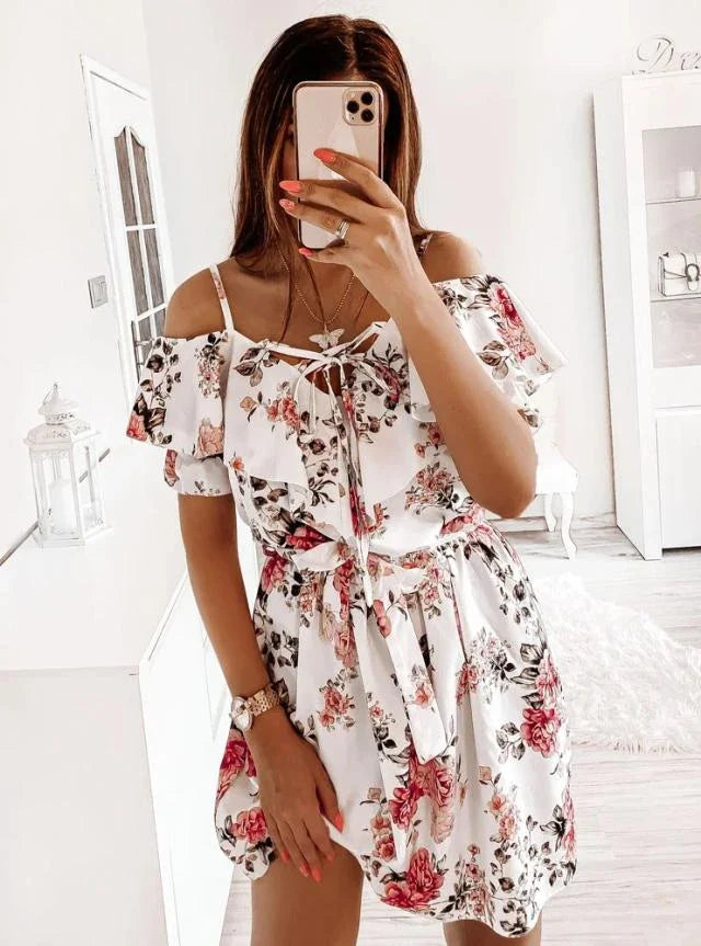 A stylish floral print dress with a flattering waist design, perfect for professional commuting