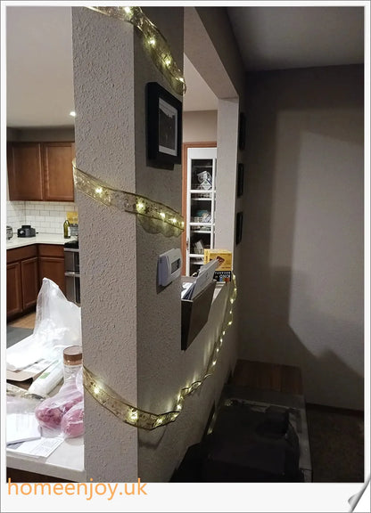 Festive Christmas ribbon fairy lights with 100 warm LED lights, available in gold and silver colours
