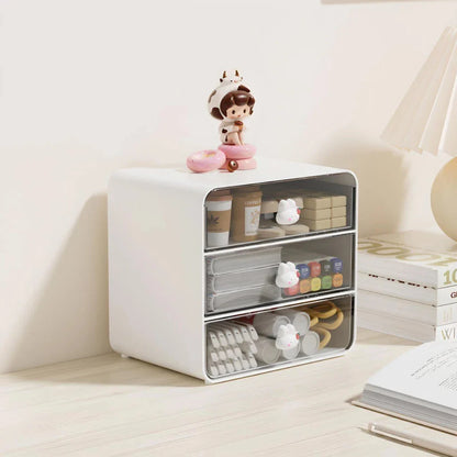 Clear acrylic desk organiser with three pull-out drawers, designed to declutter and organise your workspace