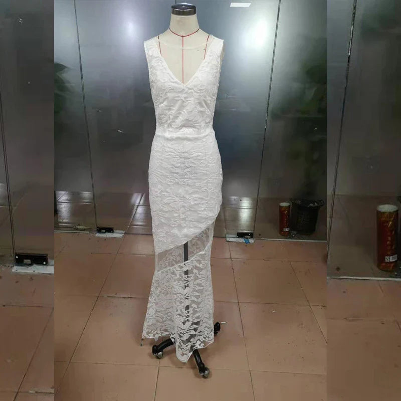 Elegant white lace cocktail dress with sleeveless design and flowing skirt