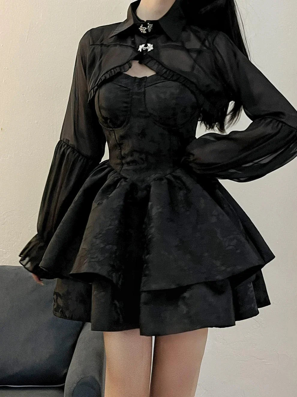 A stylish and elegant women's pettiskirt in a classic black colour, featuring a flowing A-line silhouette and premium polyester construction.