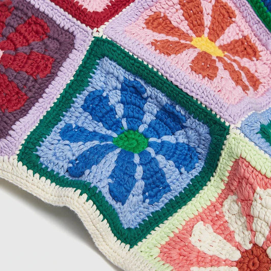 Elegant floral crochet shoulder bag in neutral and colourful designs, perfect for summer style and adventures