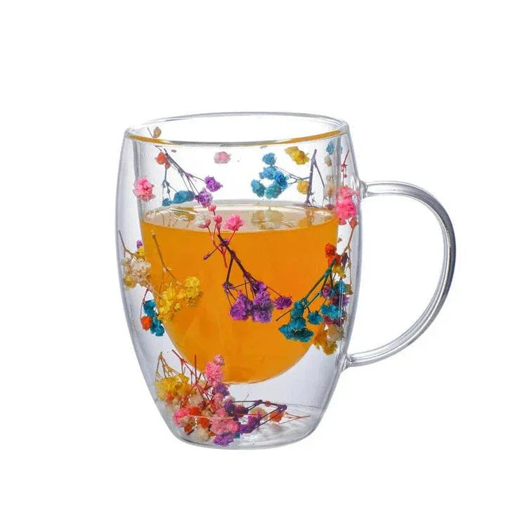 Elegant double-walled glass tea mug with a captivating floral design, ideal for hot and cold beverages