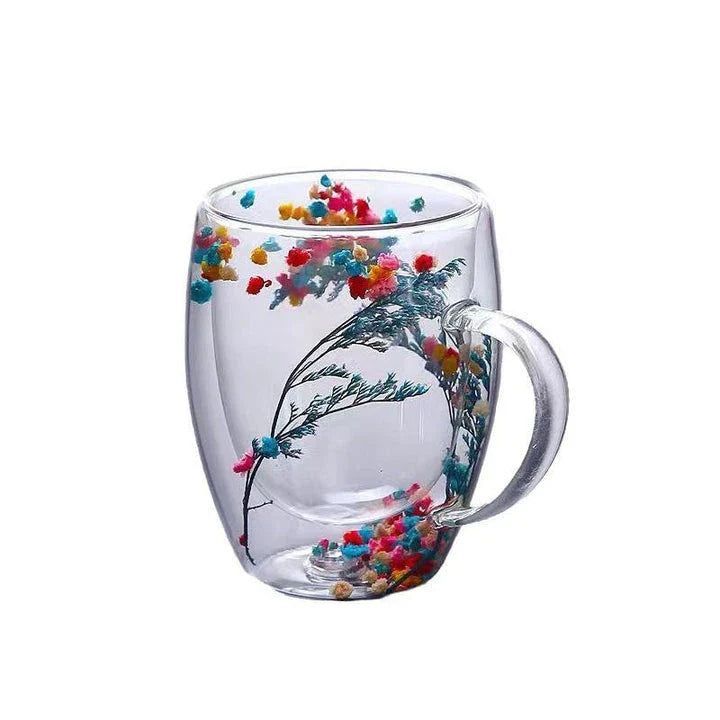 Elegant double-walled glass tea mug with a captivating floral design, ideal for hot and cold beverages