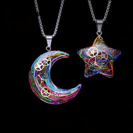 Elegant titanium steel star and moon pendant necklace with a mesmerizing cosmic-inspired design