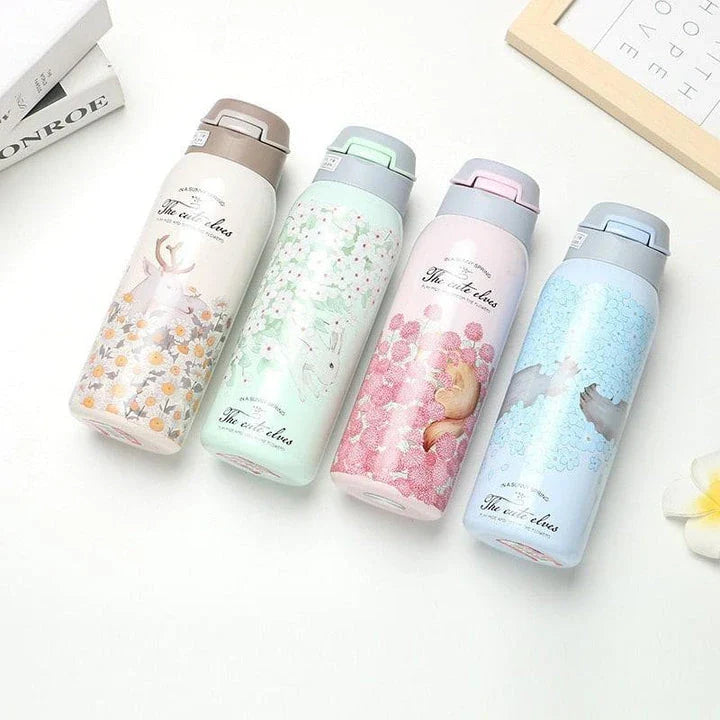 Elegant floral-patterned double-wall insulated water bottle with straw, perfect for keeping drinks chilled or warm for up to 12 hours