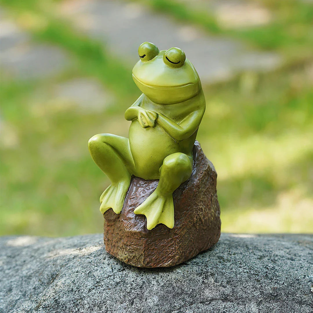 Charming resin figurine of a thoughtful, contemplative frog in a realistic pose, perfect for home or garden decor