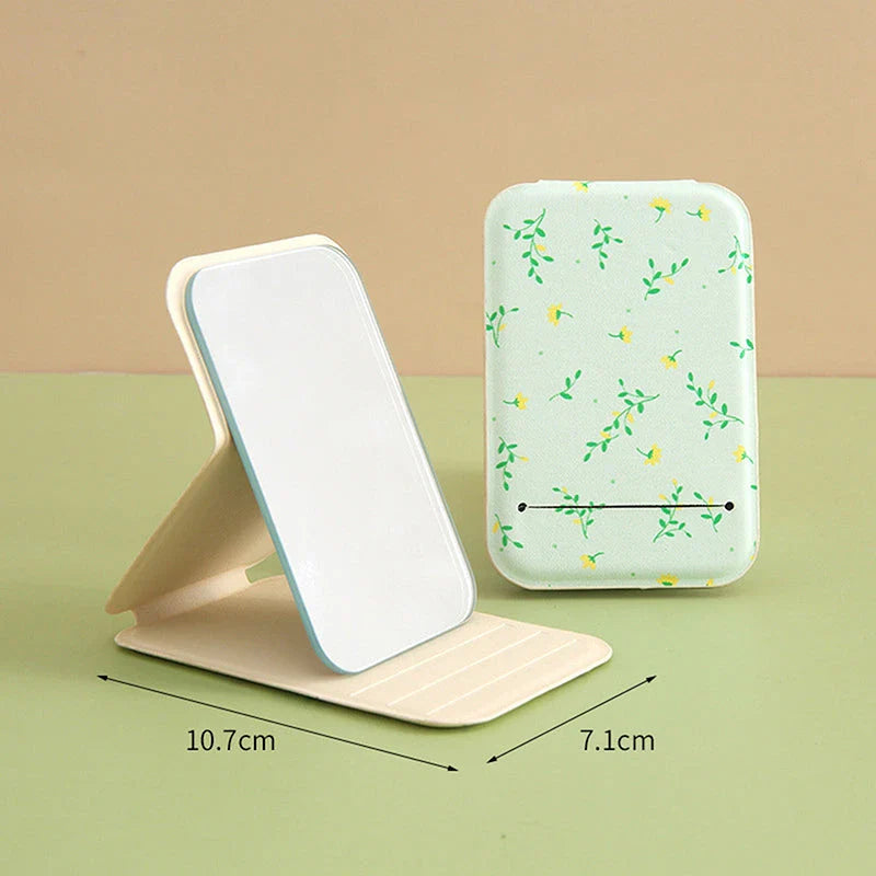Elegant floral folding makeup mirror with a unique design and clear, distortion-free reflection