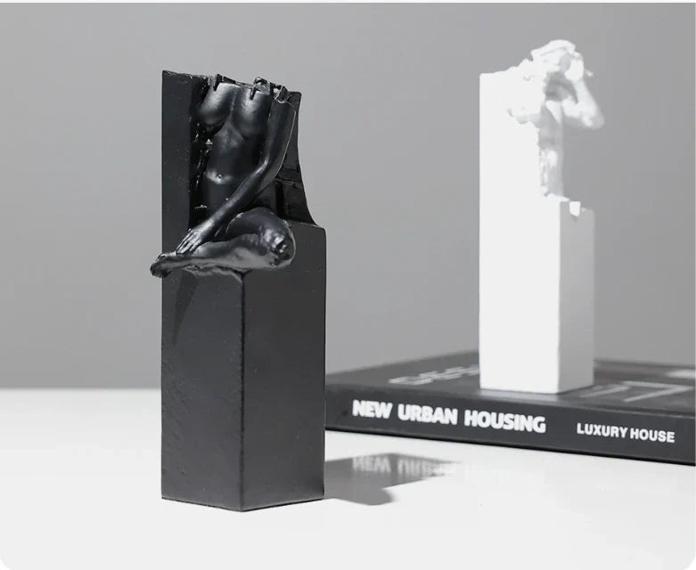 Elegant black and white abstract sculpture for desktop or study decor