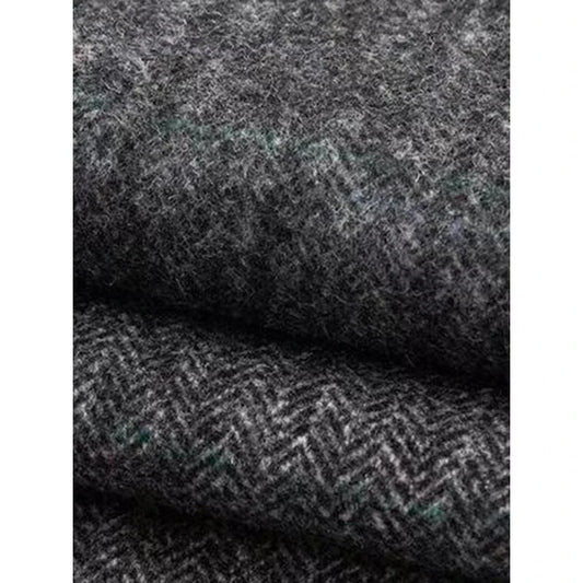 Elegant woollen wide-leg trousers in a high-waist design with unique asymmetric detailing, perfect for the discerning British woman.