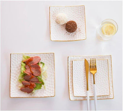 Elegant embossed ceramic cake plate in white color, perfect for serving cakes and pastries during afternoon tea