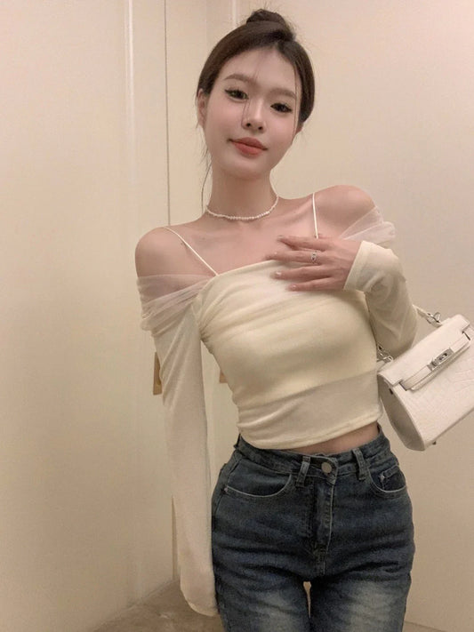 Elegant black off-shoulder blouse made of French-inspired polyester mesh fabric