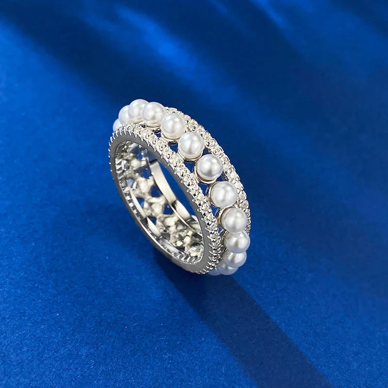 A beautiful 925 sterling silver ring with a delicate pearl accent, designed for the discerning British woman