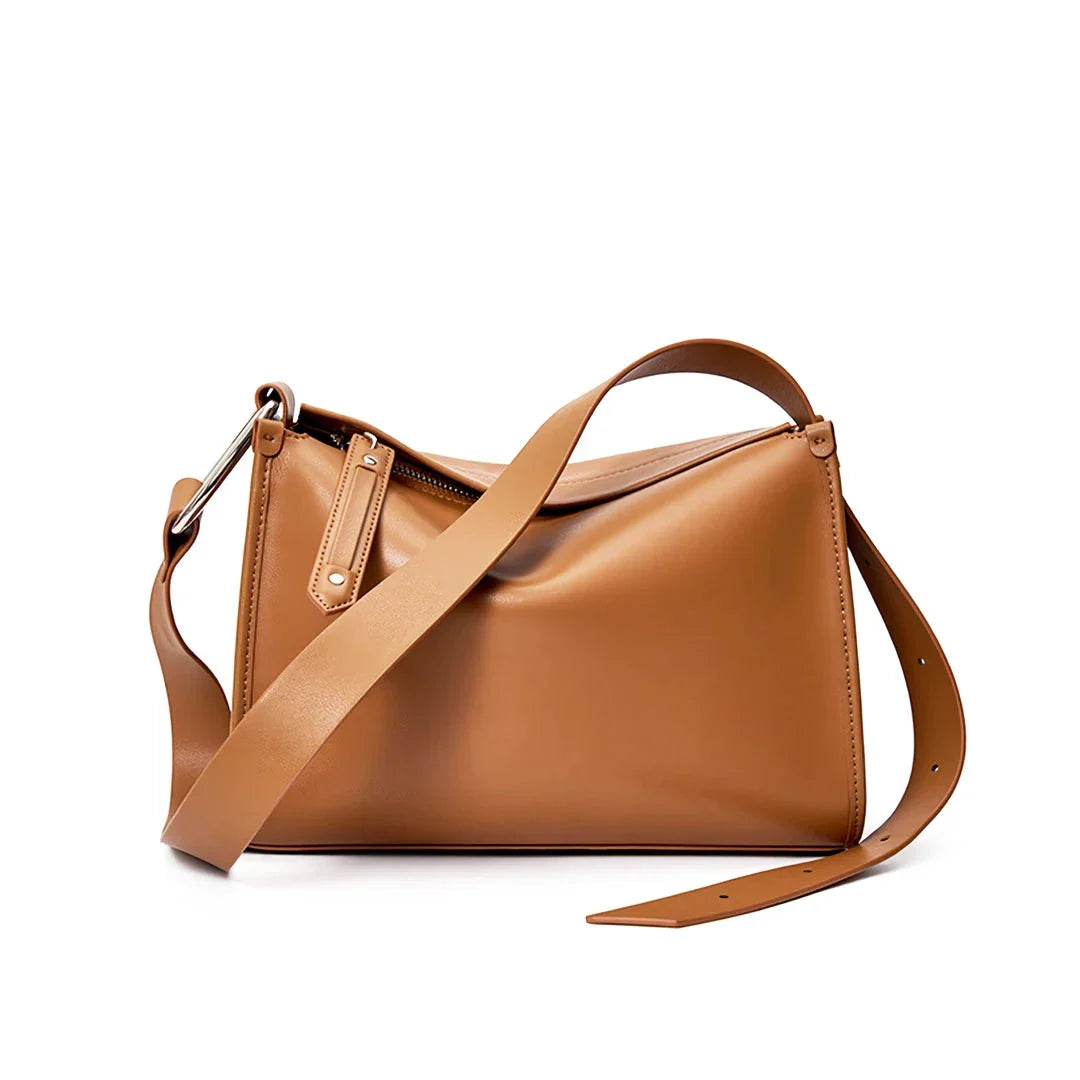 Genuine leather shoulder bag with soft, pillow-like shape and secure zipper closure