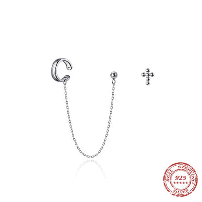 Asymmetric sterling silver one-piece earring and ear clip set with a modern and distinctive design