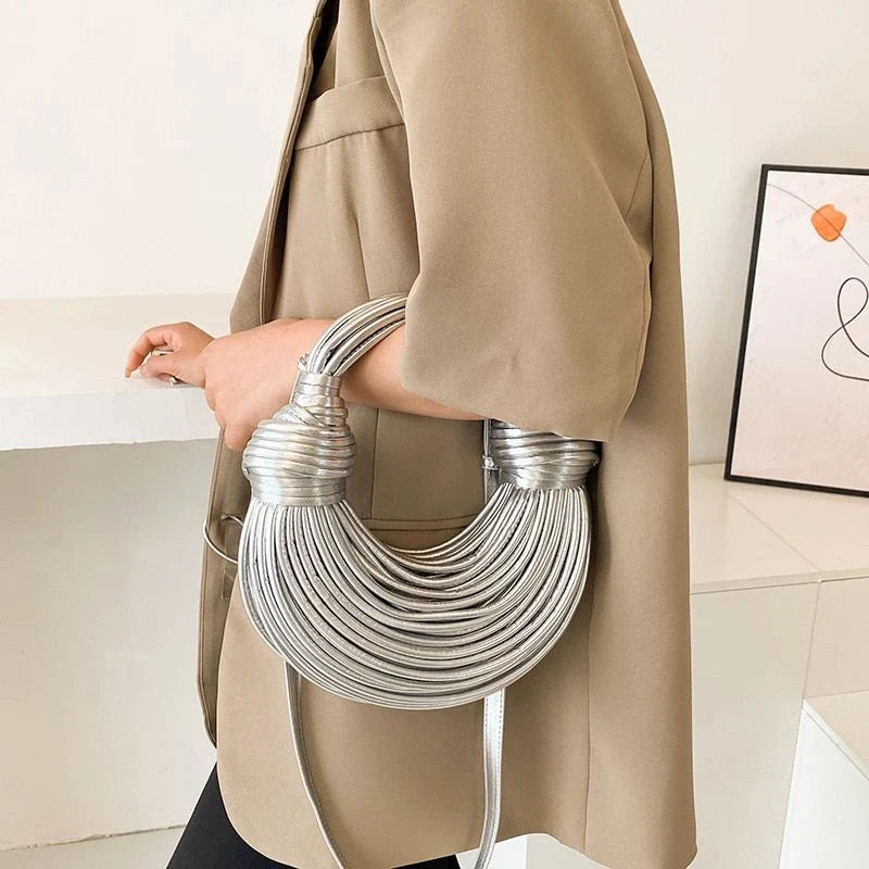 Elegant golden noodle knot evening clutch bag made from premium soft PU leather