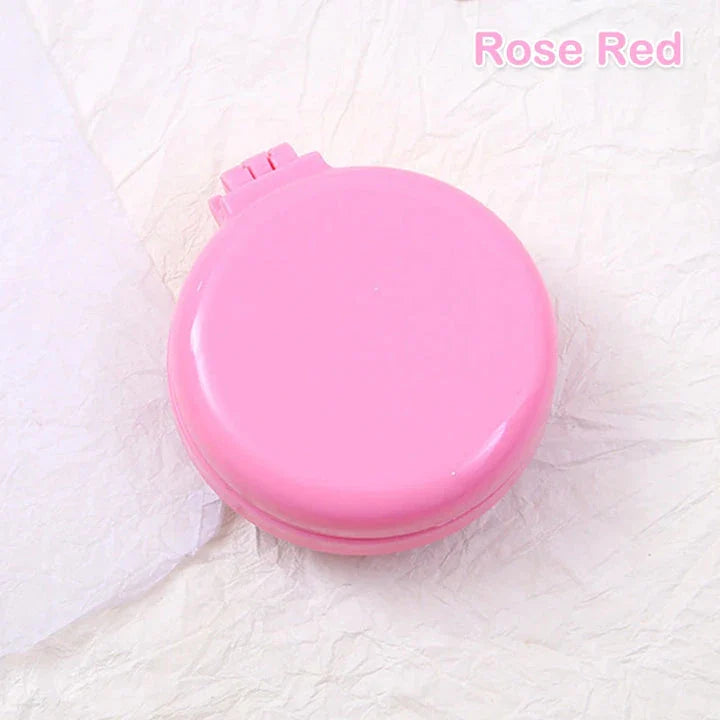 Portable folding hair comb with mirror, featuring a dual-sided design with a round mirror and eco-friendly hairbrush for on-the-go styling and grooming