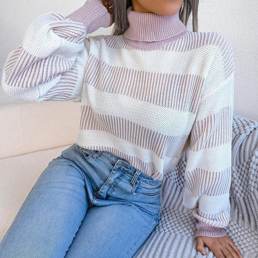 Cosy and stylish high-neck striped sweater in various colours, featuring lantern sleeves and a relaxed fit for all-day comfort.