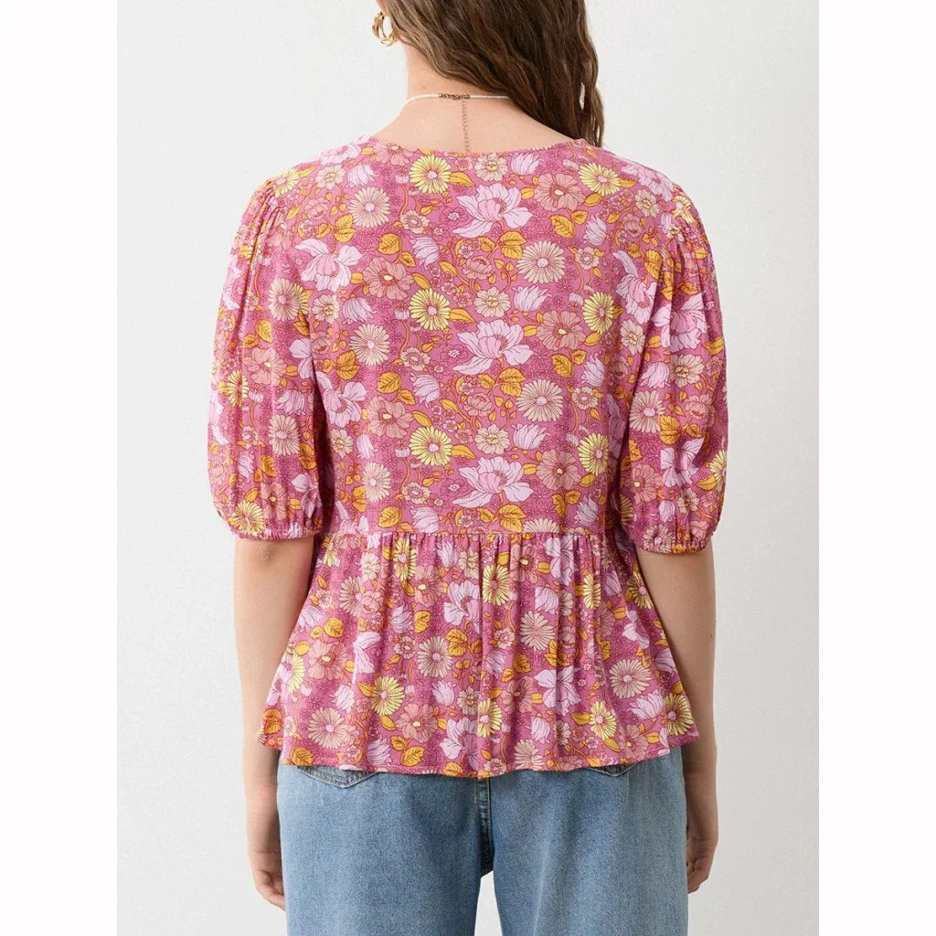Elegant floral lace-up bow blouse with unique hollow-out details and a delicate floral print