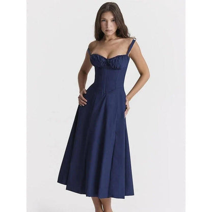 Elegant backless midi sundress in blue, featuring a stylish high split and mid-calf length for a sophisticated summer look.